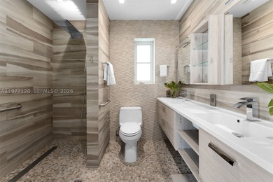 This luxurious Miami Beach estate presents a seamless blend of - photo 15
