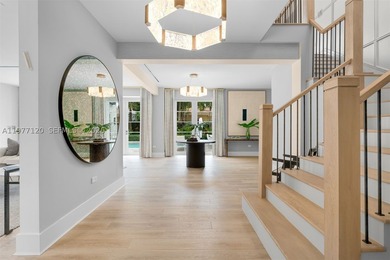 This luxurious Miami Beach estate presents a seamless blend of - photo 18