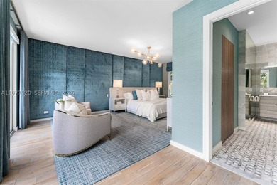 This luxurious Miami Beach estate presents a seamless blend of - photo 20