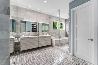 This luxurious Miami Beach estate presents a seamless blend of - photo 22