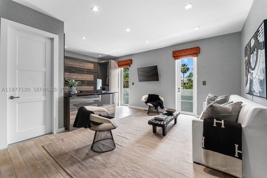 This luxurious Miami Beach estate presents a seamless blend of - photo 26