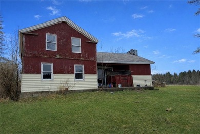 Opportunity awaits! This complete fixer-upper sits on four - photo 1