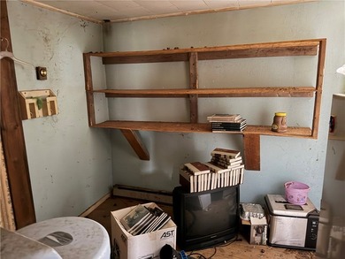 Opportunity awaits! This complete fixer-upper sits on four - photo 8