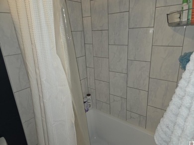 Step into the fully renovated 3 bedroom 2 bath home with a - photo 11