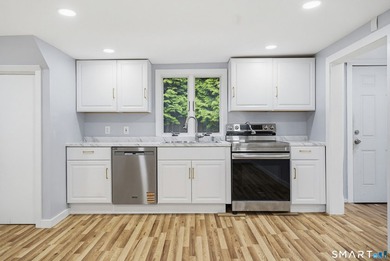 Welcome to 23 James Ave, a remodeled Colonial home exuding charm - photo 12
