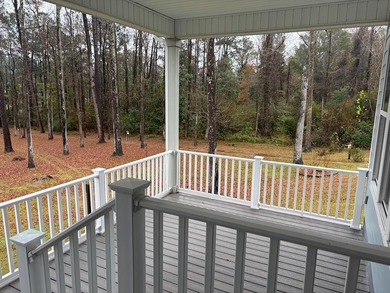 New Construction waterfront home on gently sloping lot on - photo 13