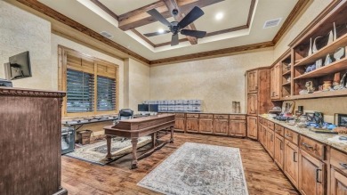 Welcome to 117 Hansma Way, a breathtaking custom ranch estate in