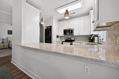 Move-in ready, two-bedroom, two-bathroom end-unit condo with - photo 14