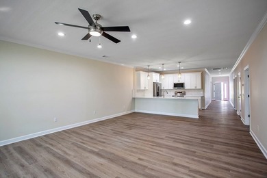 New Construction waterfront home on gently sloping lot on - photo 14
