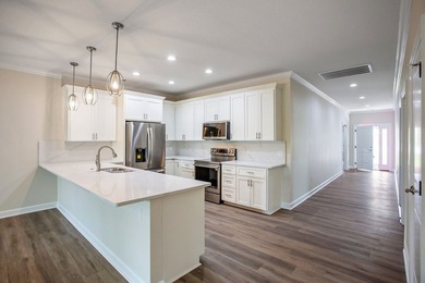 New Construction waterfront home on gently sloping lot on - photo 15