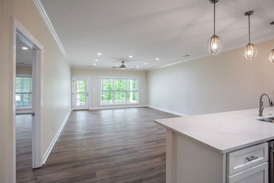 New Construction waterfront home on gently sloping lot on - photo 16