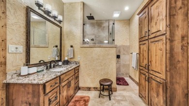 Welcome to 117 Hansma Way, a breathtaking custom ranch estate in