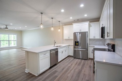 New Construction waterfront home on gently sloping lot on - photo 17