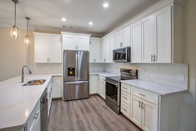 New Construction waterfront home on gently sloping lot on - photo 18
