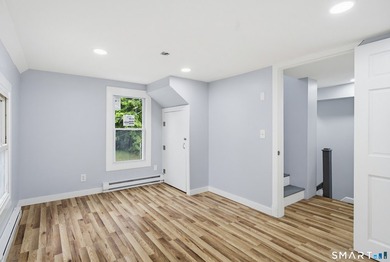 Welcome to 23 James Ave, a remodeled Colonial home exuding charm - photo 19