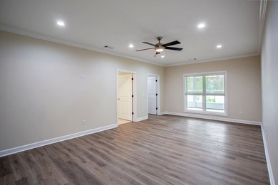 New Construction waterfront home on gently sloping lot on - photo 19