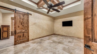 Welcome to 117 Hansma Way, a breathtaking custom ranch estate in