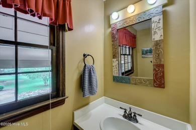 Nestled on a beautifully landscaped triple lot, this - photo 34