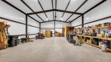 Welcome to 117 Hansma Way, a breathtaking custom ranch estate in