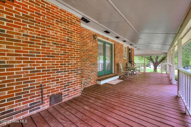 Nestled on a beautifully landscaped triple lot, this - photo 38