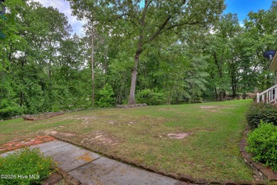 Nestled on a beautifully landscaped triple lot, this - photo 44