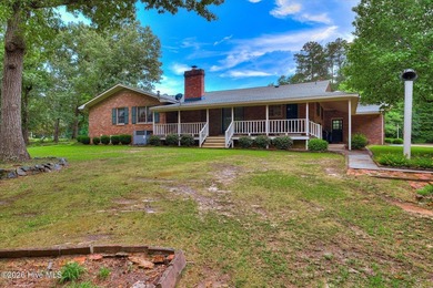 Nestled on a beautifully landscaped triple lot, this - photo 47