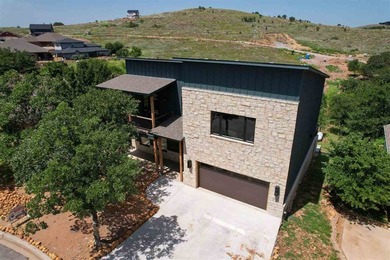 Nestled in the foothills of the Wichita Mountains, this - photo 2