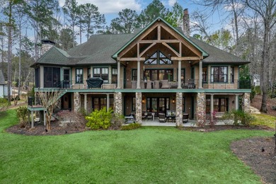 FULLY FURNISHED LAKE FRONT ESTATE LOCATED ON A COVE IN THE - photo 1