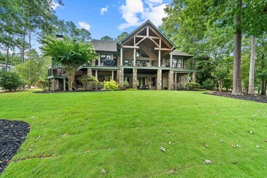 FULLY FURNISHED LAKE FRONT ESTATE LOCATED ON A COVE IN THE - photo 2