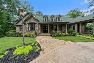 FULLY FURNISHED LAKE FRONT ESTATE LOCATED ON A COVE IN THE - photo 3
