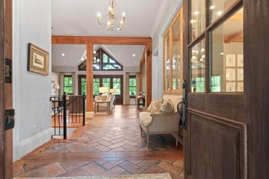FULLY FURNISHED LAKE FRONT ESTATE LOCATED ON A COVE IN THE - photo 5