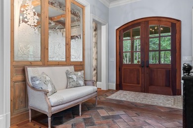 FULLY FURNISHED LAKE FRONT ESTATE LOCATED ON A COVE IN THE - photo 6
