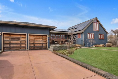 Welcome to this stunning expanded ranch located in the highly - photo 2