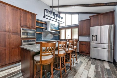 Welcome to this stunning expanded ranch located in the highly - photo 9