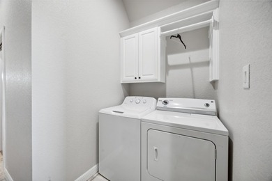 Welcome to this beautiful custom built home nestled atop the - photo 23