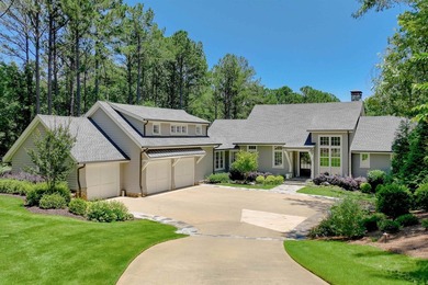 Perfectly positioned along the prestigious Oconee Course, this - photo 1