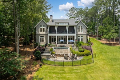 Perfectly positioned along the prestigious Oconee Course, this - photo 2