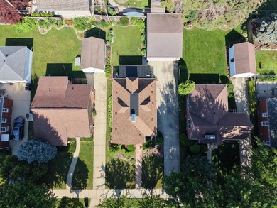 Nestled on the beautiful Eris St, in one of Racine's most - photo 5
