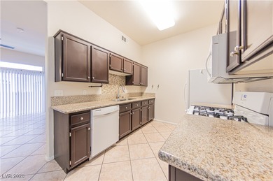 GATED 1st FLOOR 3 bed/2 bath home in Green Valley Ranch area!