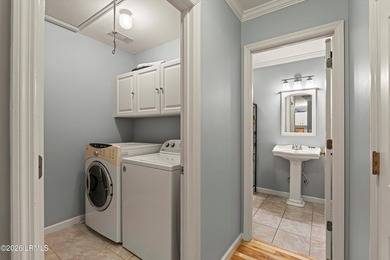 Tucked away within the gated community of Harbor Island, this - photo 23
