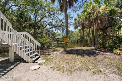 Tucked away within the gated community of Harbor Island, this - photo 32