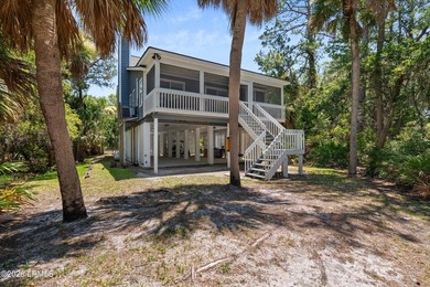 Tucked away within the gated community of Harbor Island, this - photo 35