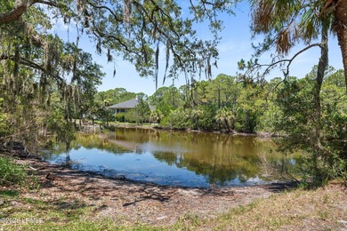 Tucked away within the gated community of Harbor Island, this - photo 36