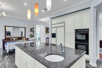 Experience elegant living in the exclusive gated community of - photo 9