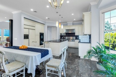 Experience elegant living in the exclusive gated community of - photo 10