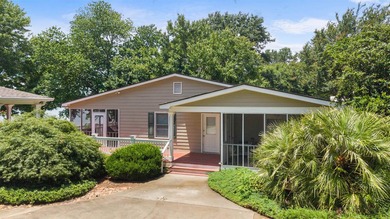 Two Lakefront Homes on this beautifully manicured site!! As you - photo 2