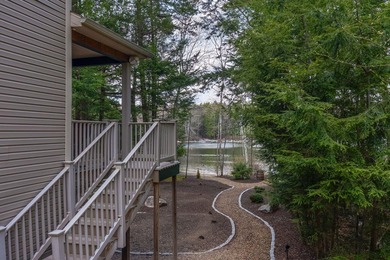 Enjoy exceptional waterfront living on Big Sebago Lake from this - photo 8