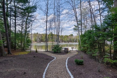 Enjoy exceptional waterfront living on Big Sebago Lake from this - photo 9