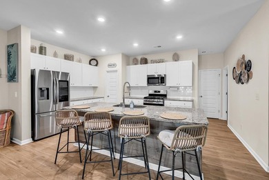 Welcome home to Coastal Charm at the Beach, a beautifully - photo 12