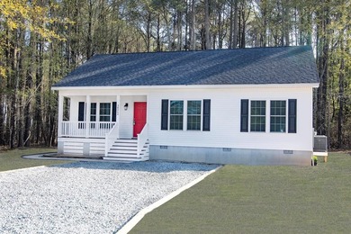 Discover modern coastal living in this stunning 3-bedroom - photo 1